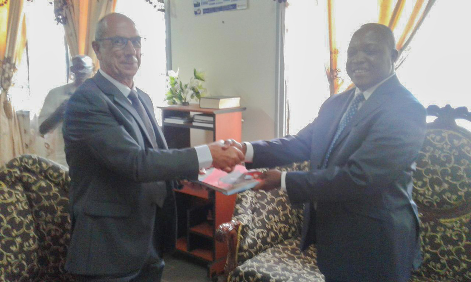 Justice Matters in the Central African Republic: CAR and the ICC sign guestbook symbolising mutual cooperation