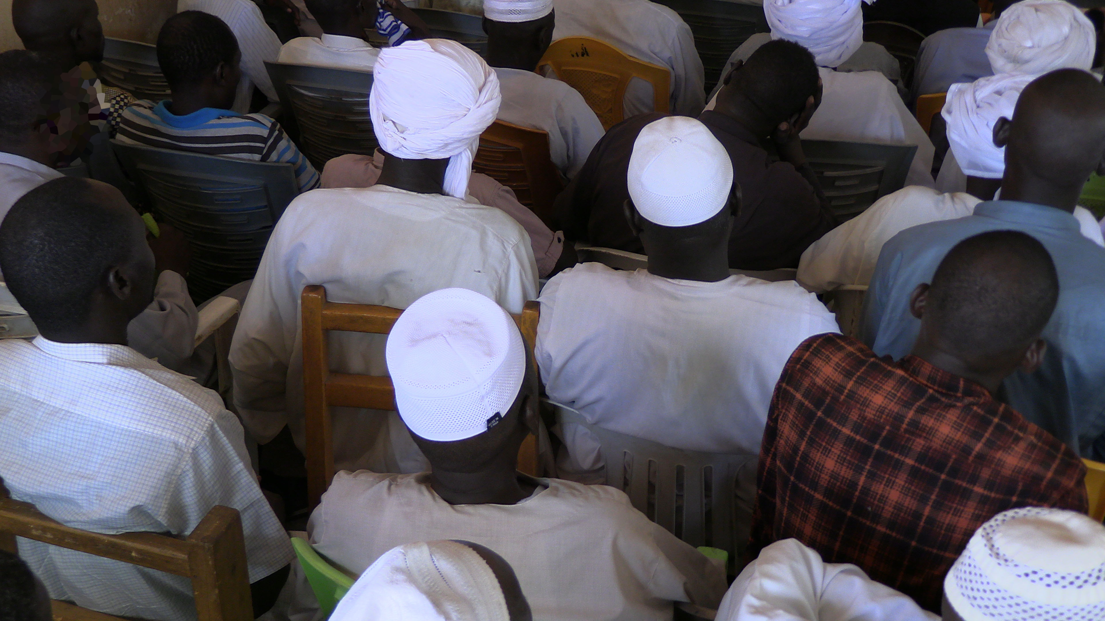 Victims at a refugee camp in Goz Beida, eastern Chad, listening to Deputy Prosecutor Nazhat Shameem Khan. Photo: ICC-CPI
