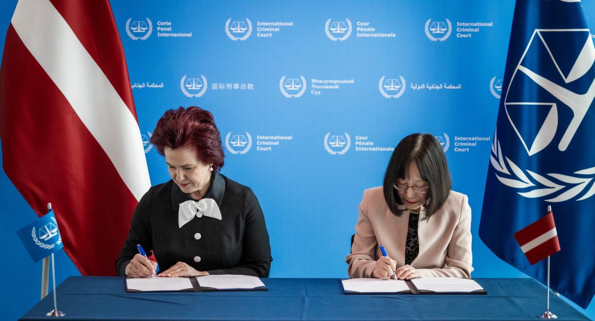 The Ambassador of the Republic of Latvia H.E. Ms Solvita Āboltiņa and ICC President Judge Tomoko Akane signing an Agreement on the Enforcement of Sentences on 28 March 2025 ©ICC-CPI