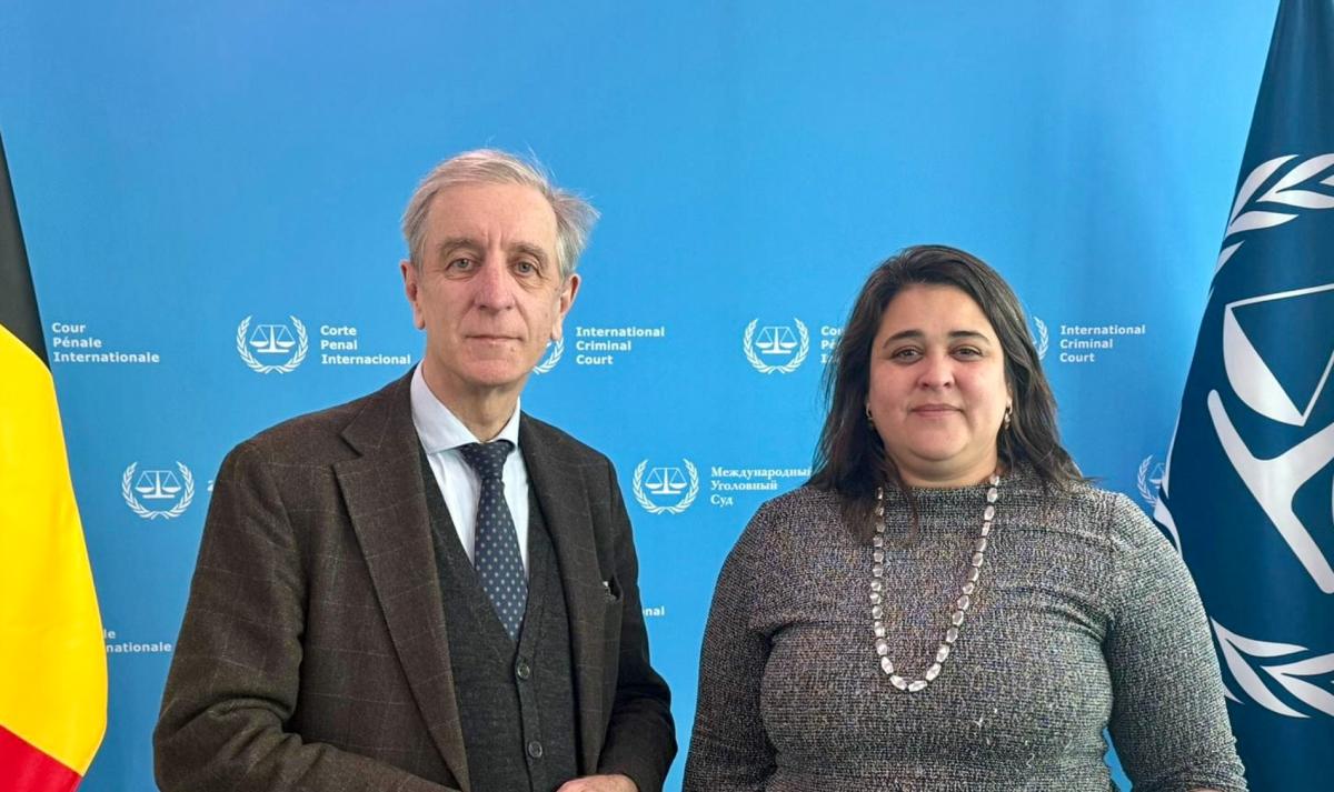  Photo: H.E. Olivier Belle, Permanent Representative of the Kingdom of Belgium to the International Organisations in The Hague, and Dr. Deborah Ruiz Verduzco, Executive Director of the Trust Fund for Victims at the ICC on behalf of the Board of Directors, at the ICC Headquarters in The Hague, the Netherlands