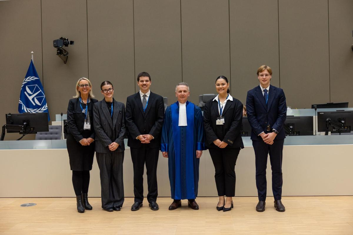 The presiding judge of the competition’s jury, judge Gocha Lordkipanidze, with the winning team